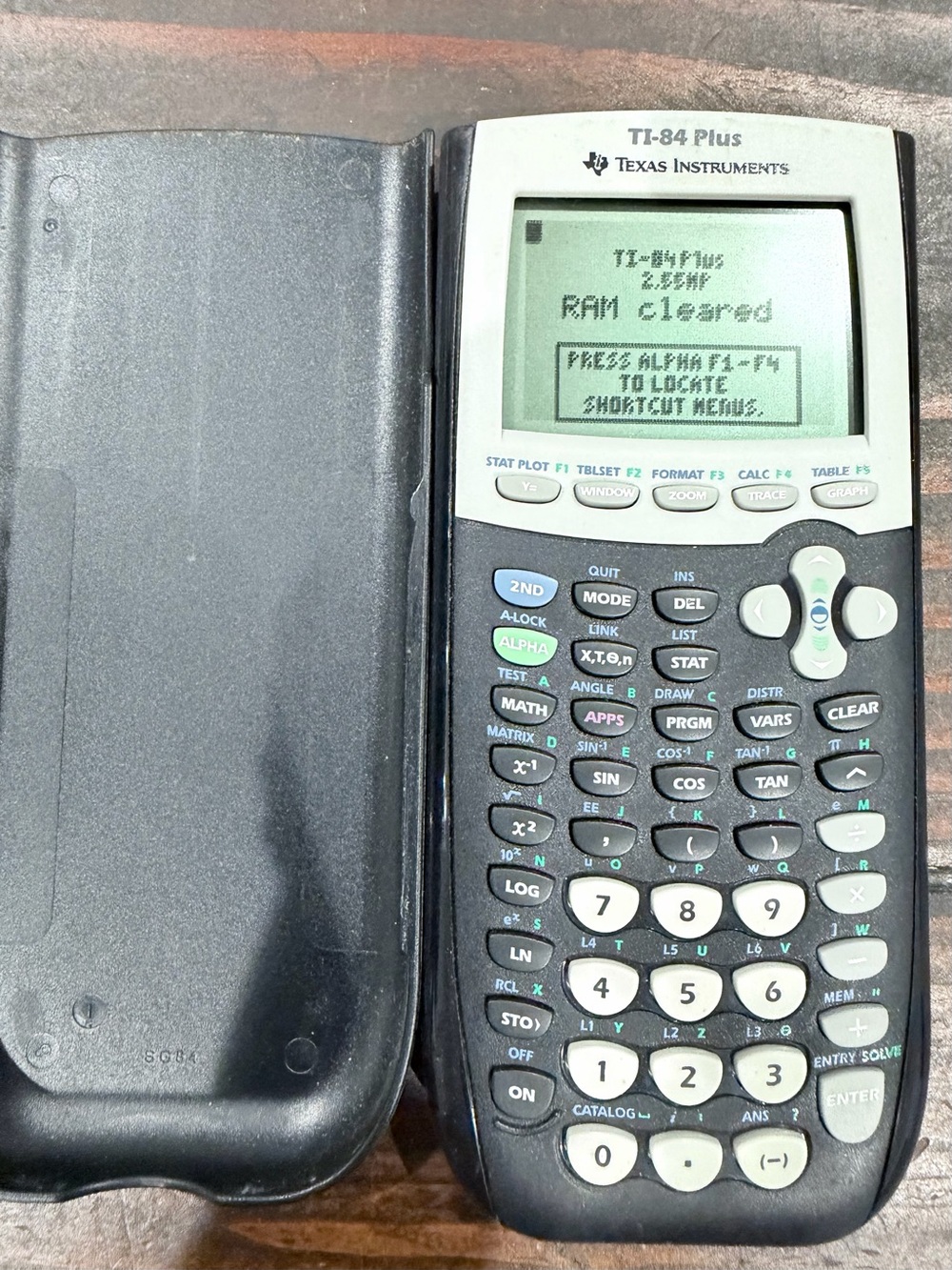 Texas Instruments TI-84 plus calculator.